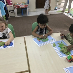 Enjoy sensory play with playdough and caterpillar mats.