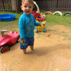 Gus having some muddy puddle fun!