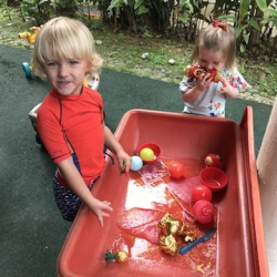 Having fun at our Chinese New Year themed water table!