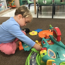 Henry having fun with cars.