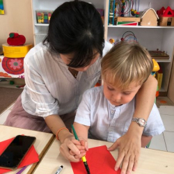 Henry working on his Chinese calligraphy craft!