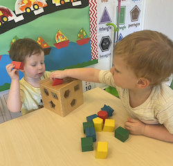 Thomas and George were working together to learn shapes and colours today.