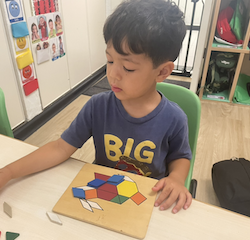 Isaac working with shape pattern matching.