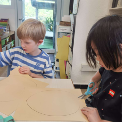 Asher and Kane cutting out their 'good egg'. 