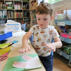 Jamie is busy working on his Easter craft.