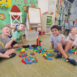 The children work in cooperation to build this together.