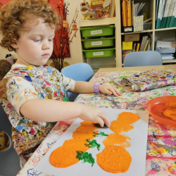 Tilly printing mandarin oranges.