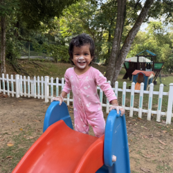 Big smiles from Niva Aria who thoroughly enjoyed sensory play!