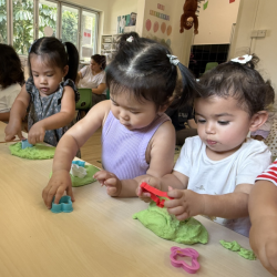 Harper, Ellie and Skyla enjoying playing with the Playdoughh!