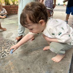 Liam doing some chalk drawing