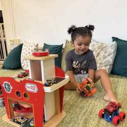 Malhar enjoying playing with all the cars!