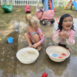 Cara and Eleanor enjoying splash time