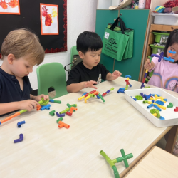 Leo , Wesley and Eden getting creative with connected tubes. 