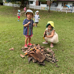 Wesley and Eden having fun with nature scavenger hunt.