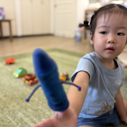 Constance loves manipulating with the crayons finger puppets!