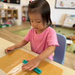 Constance working on her clay craft!