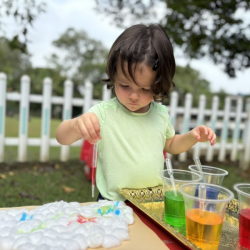 Cru making rainbow clouds and experimenting with colours!