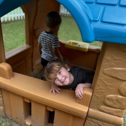 Imogen loves being in the playhouse!