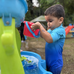 Kavi loves pouring and watching water trickle down from the trough’s feature!