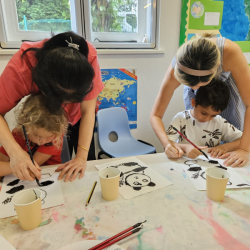 Practising Chinese calligraphy painting.