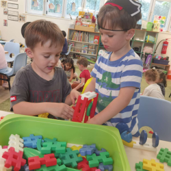 Teamwork in action with buikding blocks!