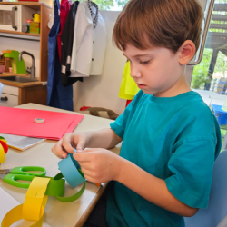 Wilbur choosing the colours for his paper chain. 