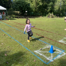 Alba at the finish line with a great smile.