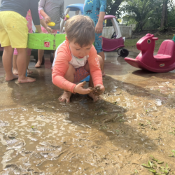 Alex is getting messy in the mud. .