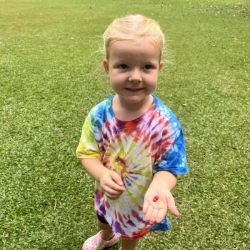 Eleanor proud to find the red seeds. 