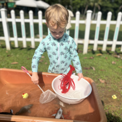 Kingston enjoying his first splash time experience. 