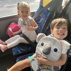 Klaudia and Xiang super excited to be on the school bus. 