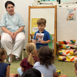 Leo sharing a special moment during Show and Tell with friends.
