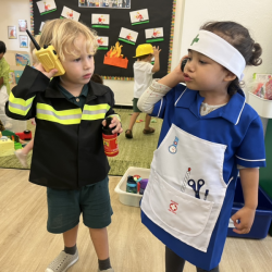 Nurse Alba and Fireman Kingston calling the cops.