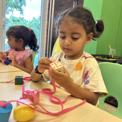Imaan's working on her threading skills!