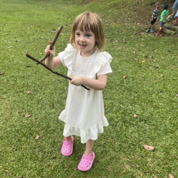 Clara exploring with the sticks