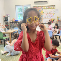 Reina made glasses using connecter sticks.