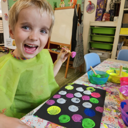 Joshie loves printing these colourful circles.