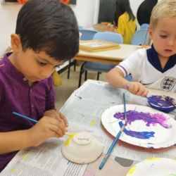 Putting finishing touches to our diyas