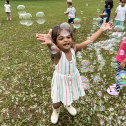 Sara catching the bubbles!