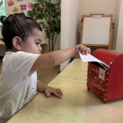 Skyla posting her letter to Santa!