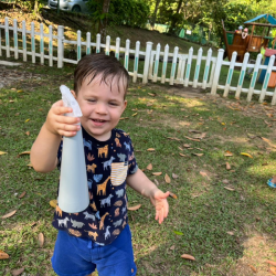 Luca-enjoying-playing-with-the-spray-bottle