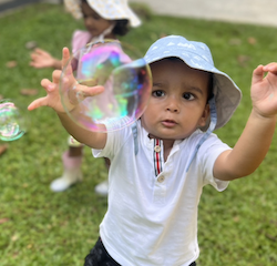 Kavi popping the bubbles