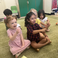 Kate and Ruhi having fun with jolly phonics songs and actions. 