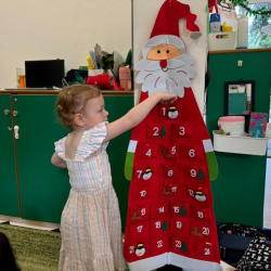 Kate excited to pick her gift from our Santa advert calendar . 