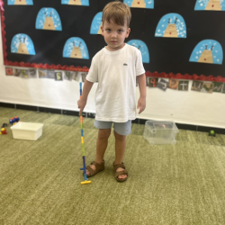 Leo built a grass cutter using connecter tubes. 