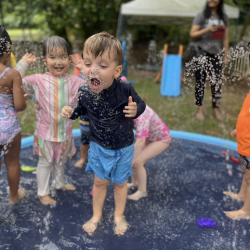 Leo is having a fantastic time at splash time.