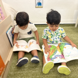 Mateo and Kai enjoying their reading time.