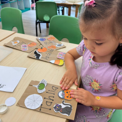 Tahlia is working on her trick or treat bag 