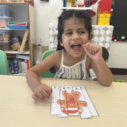 Kainaat completing her Christmas number puzzle. 