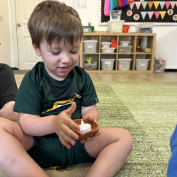 Alex exploring clay diyas with little LED tea candles!